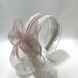 Felpa para niñas con lazo rosa de tul, vista lateral.